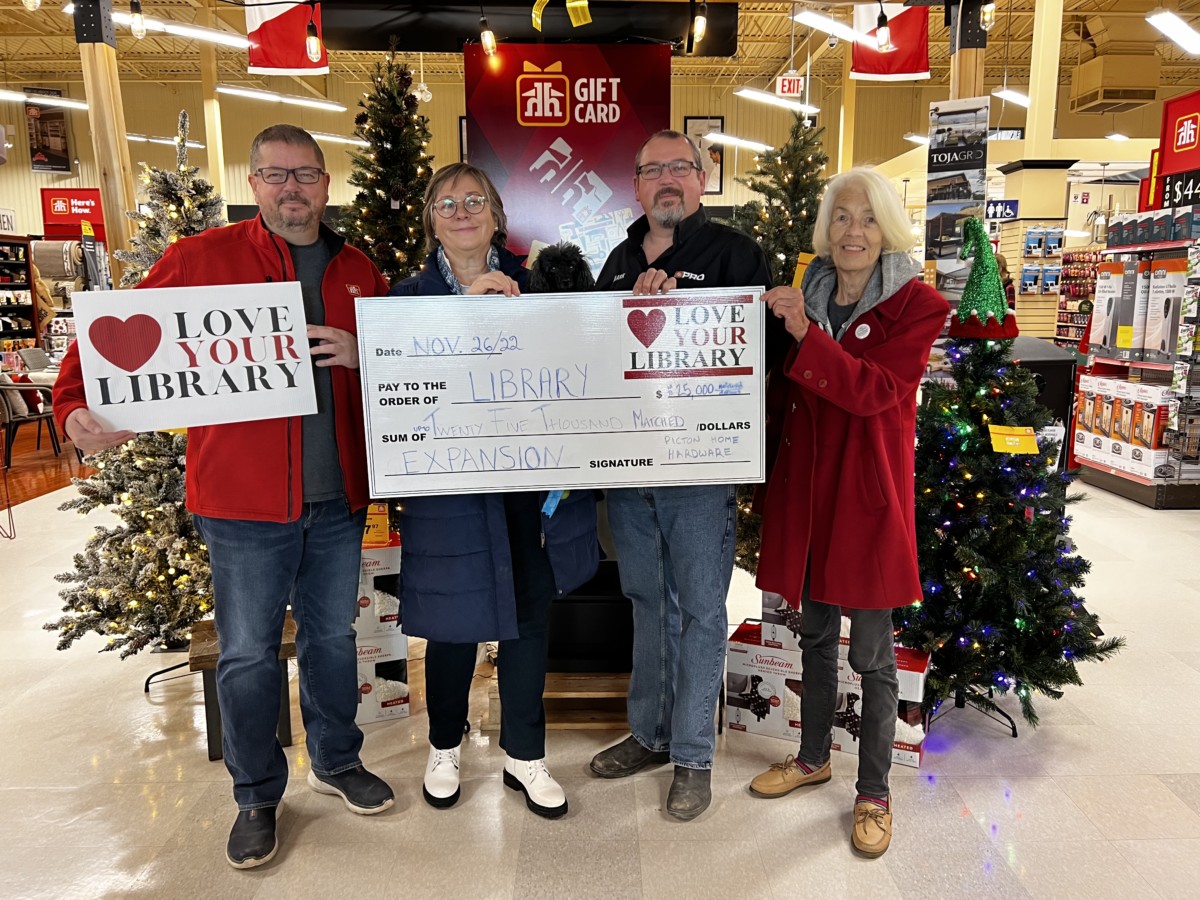 A photograph of Adam Busscher, Alexandra Bake, Mark Busscher, and Devon Jones at Picton Home Hardware.